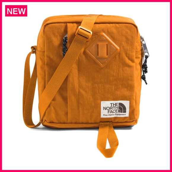 Water-Repellent Crossbody Bag with Adjustable Strap and Internal Divider
